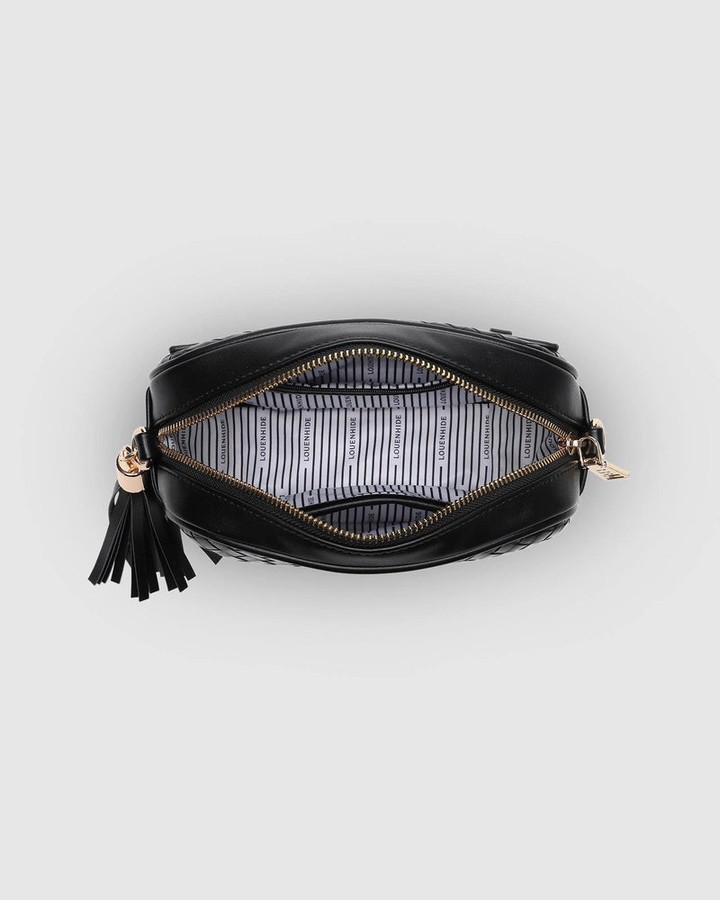 The Louenhide Jacinta Black Woven Crossbody Bag is the ultimate everyday bag for women looking for style without compromising function. Now available in two new woven print textures to add to your collection of classic camera bags. Walk out in style with this casual women’s crossbody bag and keep your essentials secure with its slip and zip pockets. The Jacinta Black is a staple in the Louenhide world, loved by women of all ages and style.