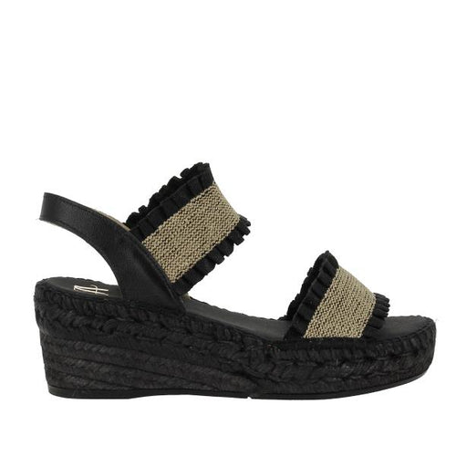 This tried and proven favourite espadrille has a 7cm rope wedge and the wide elasticized straps are finished with a small frill. A well fitted and comfortable sandal. Made in Spain.