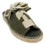 Made in Spain by Juncal Aguirre this suede espadrille slide has an adjustable front made possible by a wide flat lacing over the instep. The leather comes well back on the foot giving good support.