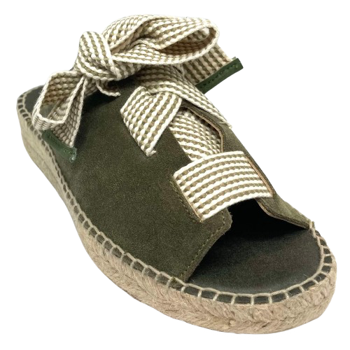 Made in Spain by Juncal Aguirre this suede espadrille slide has an adjustable front made possible by a wide flat lacing over the instep. The leather comes well back on the foot giving good support.