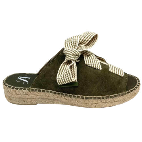 Made in Spain by Juncal Aguirre this suede espadrille slide has an adjustable front made possible by a wide flat lacing over the instep. The leather comes well back on the foot giving good support.