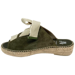 Made in Spain by Juncal Aguirre this suede espadrille slide has an adjustable front made possible by a wide flat lacing over the instep. The leather comes well back on the foot giving good support.