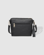 The Louenhide Kasey Crossbody Bag is a classic women's everyday bag with elevated style. Designed in a soft and slouchy design, this casual crossbody bag is a smaller take on our best-selling Daisy Crossbody Bag. Secure your favourite products in either the zip pocket, the two slip pockets or in the interior compartment for your bigger items such as sunglasses, purse and phone with ease. Perfect to take you from dusk to dawn, relaxed styling has never been easier with this gorgeous style.