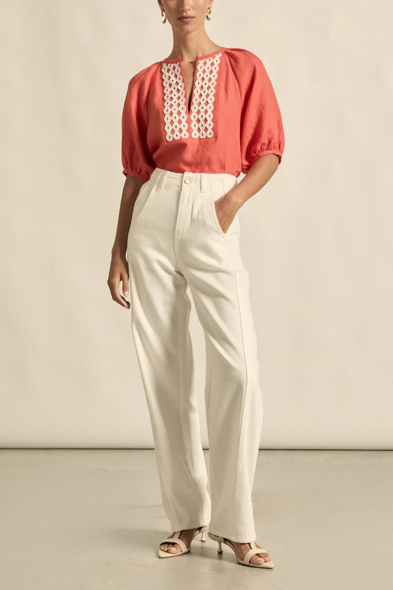 lace detailing and soft gathers add textural interest to a versatile silhouette.

100% breathable linen
centre front bib lace panel
round neckline with v-split and soft binding
soft gathers at neck and sleeve head
raglan 3/4 sleeve balances shape beautifully