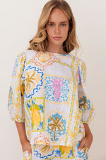 100% linen in the fresh Amalfi Print of lemons and blues is in this sweet little top with it's elbow length sleeve.