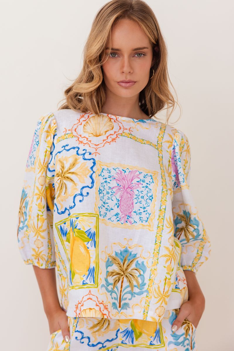 100% linen in the fresh Amalfi Print of lemons and blues is in this sweet little top with it's elbow length sleeve.