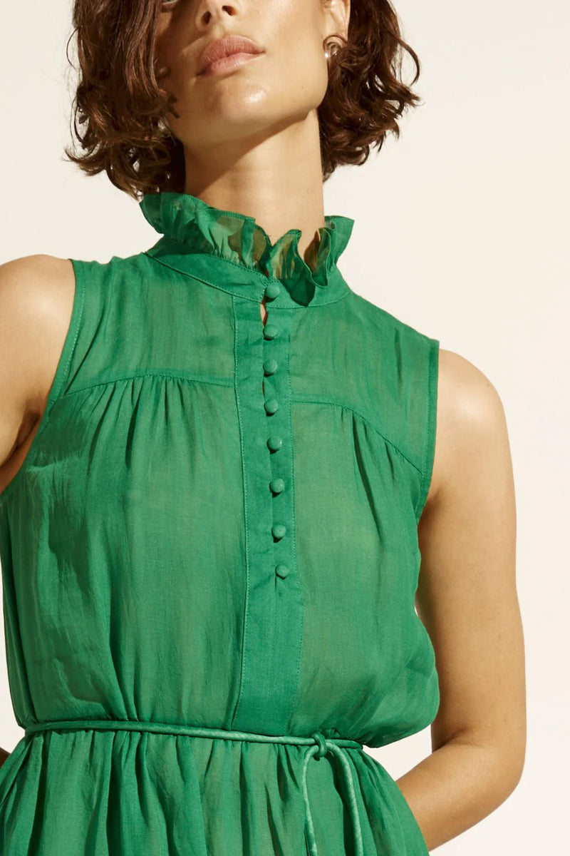 The Marquee is a sleeveless design that speaks to modern and effortless styling. A ruffled neckline that leads into covered buttons is feminine yet perfect for every day.&nbsp;