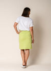 This lovely A-line knee length skirt is designed to bring a touch of elegance to your wardrobe. It features a comfortable elastic waistband & a drawstring  for an easy fit, while the white writing adds a subtle and stylish flair. Delicate fringing provides a playful yet sophisticated detail, making this skirt perfect for both casual outings and special occasions. Its straights silhouette with an angled hem  offers a flattering shape, combining comfort with a chic, modern look.

The fabric is 100% cotton, wh