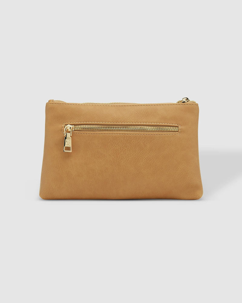 The Louenhide Mimi Clutch is your new everyday staple. Where elegance meets functionality, this compact silhouette can effortlessly transform your style from day to night. Style and wear the webbing wristlet for a more casual everyday look, or interchange for the matching vegan leather wristlet to elevate your night out attire. Made from a smooth vegan leather, this casual women's clutch offers ample space fit for all your everyday essentials. 
