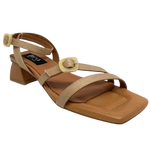 Made in Spain by Neo this gorgeous sandal in a beautiful neutral shade of camel and with its cute little 4.5cm heel will take you many places. The well placed straps are of raffia (with leather lining) and have a small "horn" buckle at the top of the foot and at the ankle.