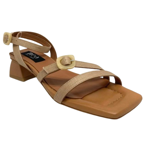 Made in Spain by Neo this gorgeous sandal in a beautiful neutral shade of camel and with its cute little 4.5cm heel will take you many places. The well placed straps are of raffia (with leather lining) and have a small "horn" buckle at the top of the foot and at the ankle.