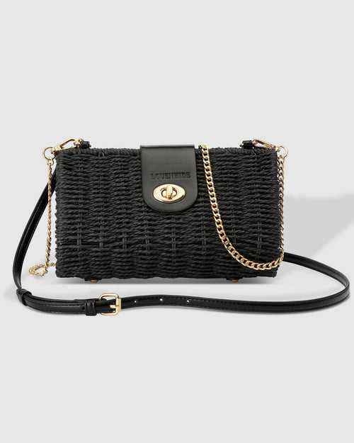 The Louenhide Ophelia Raffia Crossbody Bag is an effortlessly luxe, structured crossbody, perfect for summer evenings. Adding a touch of luxury, the metallic vegan leather creates a harmonious fusion of textures that is sure to turn heads. Opening effortlessly to reveal a spacious interior, this luxe women’s crossbody bag, allows you to organise your summer necessities while keeping them secure with the turn lock closure. 