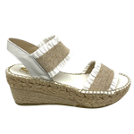 This tried and proven favourite espadrille has a 7cm rope wedge and the wide elasticized straps are finished with a small frill. A well fitted and comfortable sandal. Made in Spain.