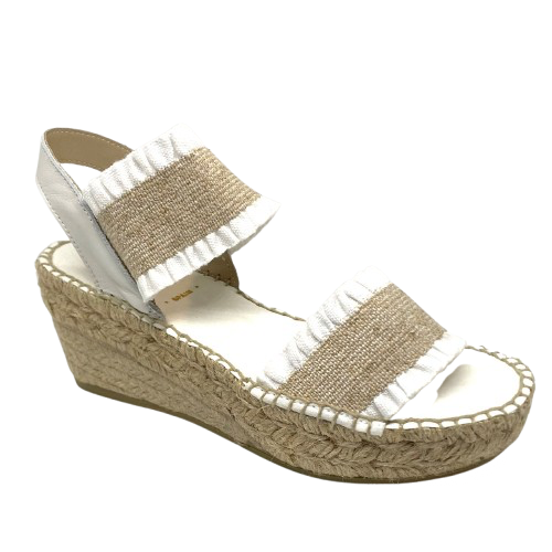 This tried and proven favourite espadrille has a 7cm rope wedge and the wide elasticized straps are finished with a small frill. A well fitted and comfortable sandal. Made in Spain.