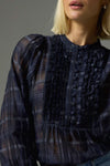90% cotton 10% silk
Gathered ruffle layers with a deep bib
Full-length blouson sleeves
Lightweight ramie for relaxed elegance
Covered buttons run through the centre front