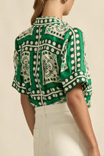 The pixel top is a celebration of clean lines and elevated details. The concealed placket and crisp collar balance ease with modern polish.

100% linen
concealed button placket for a seamless finish
zk exclusive coffee collage print
printed collar and subtle side splits for flattering aesthetic
relaxed off-the-body fit
designed to pair with the gesture pant for co-ord styling
perfect for holiday or everyday wear