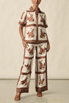 100% linen
concealed button placket for a seamless finish
zk exclusive coffee collage print
printed collar and subtle side splits for flattering aesthetic
relaxed off-the-body fit
designed to pair with the gesture pant for co-ord styling
perfect for holiday or everyday wear