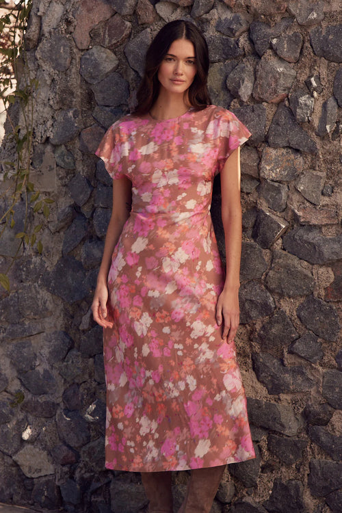 The Proxy Dress is the perfect transitional piece, offering fluid movement with modern sophistication. Crafted from a printed cotton-silk blend, it features a round neckline and bias-cut skirt for a flattering drape. see product details below.

color: blush blur