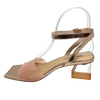 A handy little pair of heels to have in any wardrobe. The wide vinylite band of nude across the toe is soft and comfortable and the wrapped ankle strap and square toe are of rose gold leather. The clear block heel is shapely and a comfortable 6.5cm. Made by Django & Juliette.