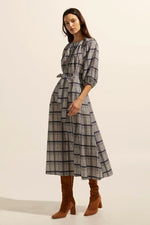 An a-line midi accentuated by a self-tie belt, the Regard strikes an unmistakably feminine silhouette .It's gathered neckline and ruffle feature offers a feminine flourish. Three-quarter length sleeves finish is loose fitting cuff and inject a note of effortless energy.    Colour: Ink/Porcelain Check
