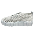 Made in Turkey by Rilasarre this comfortable little summer sneaker is mesh covered in a white lace. It has a cushioned footbed and a chunky white sole and is cool and ventilated for our summer months.