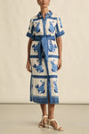 a vibrant statement print immersed in royal blue hues makes the roam dress perfect for resort styling or everyday luxury.

100% linen
crisp collar and covered placket deliver refined finish
custom zk exclusive azure collage print
wide self-tie belt for tailored shape
side split and relaxed fit offer comfort and movement
finished hem and sleeve trim for elevated detail
vacation-ready and trans-seasonal