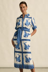 a vibrant statement print immersed in royal blue hues makes the roam dress perfect for resort styling or everyday luxury.

100% linen
crisp collar and covered placket deliver refined finish
custom zk exclusive azure collage print
wide self-tie belt for tailored shape
side split and relaxed fit offer comfort and movement
finished hem and sleeve trim for elevated detail
vacation-ready and trans-seasonal