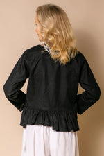 Embrace Romy: a bolero-style jacket that promises to elevate anything she is paired with. Romy features a single button closure and gathered frill hem for a touch of femininity. With sleeves and pockets, Romy offers both style and functionality. Whether you're layering over a sundress or adding flair to your casual ensemble, Romy is your next go-to for the summertime.  Bolero-style Single button closure Gathered frill hem Pockets Material: 45% Cotton/55% Linen  Designed in Australia