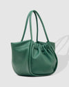 The Louenhide Selina Green Tote Bag is where functionality meets style and flair. With distinctive pipe detailing and a modern ruched opening, this medium sized tote bag will become a versatile and eye-catching addition to your collection. Transforming a classic women's tote bag silhouette into a statement piece of the season, 