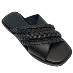 This classic little flat slide differs from the usual by having one of the wide cross over straps plain leather and the other a combination of plaiting, whip stitching and weaving of the leather. A great wardrobe "go to".
