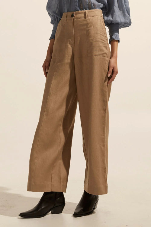 The Signify pant is a high-waisted, wide-leg style that offers a contemporary and flattering option relevant to the season. Constructed in 100% linen with a fitted waistband and zipper, this piece is lightweight and ideal for trans-seasonal wear.    Colour:  Stone
