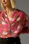 The Stage Top brings refined comfort and subtle drama to everyday dressing. Designed in lightweight cross-dye ramie, it features a V-neckline, soft shirring at the neck and sleeves, and contrasting shell buttons with gold accents.&nbsp;

The three-quarter sleeves with a v-neckline off a flattering, relaxed finish.