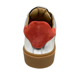 This cool little leather sneaker has a gum sole and silver outer with black side stripes, red suede at the heel land red laces.