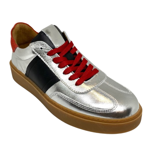 This cool little leather sneaker has a gum sole and silver outer with black side stripes, red suede at the heel land red laces.