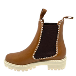 This gorgeous little ankle boot comes in a rich brandy coloured leather, has chocolate elastic in the sides, features white blanket stitching which ties in with the white chunky sole. Made by Bresley.