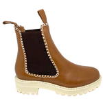 This gorgeous little ankle boot comes in a rich brandy coloured leather, has chocolate elastic in the sides, features white blanket stitching which ties in with the white chunky sole. Made by Bresley.