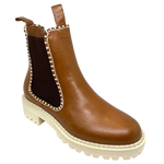 This gorgeous little ankle boot comes in a rich brandy coloured leather, has chocolate elastic in the sides, features white blanket stitching which ties in with the white chunky sole. Made by Bresley.