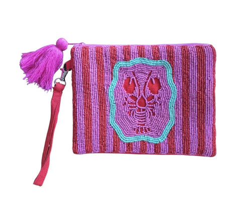 A fun beaded clutch featuring an embroidered red lobster on a striped background of red and pink beads with a touch of aqua&nbsp; beading. The back of the bag is red canvas. A pink tassel hangs from the zipper and a wrist strap is attached for convenience. It measures 19cmx17cm.