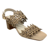 Lazer cut leather is always beautifully soft and interesting. These sandals are even more so as they also have tiny gold studs dotted along the two wide straps that run across the foot. The leather is almond in colour and the stacked heel is 7cm in height. Made by Django &amp; Juliette.