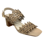 Lazer cut leather is always beautifully soft and interesting. These sandals are even more so as they also have tiny gold studs dotted along the two wide straps that run across the foot. The leather is almond in colour and the stacked heel is 7cm in height. Made by Django &amp; Juliette.