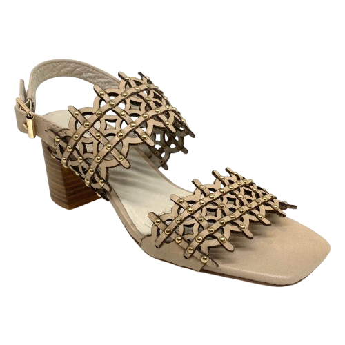 Lazer cut leather is always beautifully soft and interesting. These sandals are even more so as they also have tiny gold studs dotted along the two wide straps that run across the foot. The leather is almond in colour and the stacked heel is 7cm in height. Made by Django &amp; Juliette.