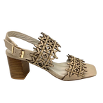 azer cut leather is always beautifully soft and interesting. These sandals are even more so as they also have tiny gold studs dotted along the two wide straps that run across the foot. The leather is almond in colour and the stacked heel is 7cm in height. Made by Django &amp; Juliette.