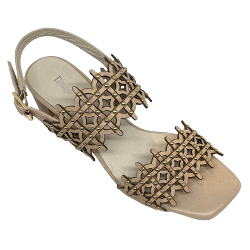 azer cut leather is always beautifully soft and interesting. These sandals are even more so as they also have tiny gold studs dotted along the two wide straps that run across the foot. The leather is almond in colour and the stacked heel is 7cm in height. Made by Django &amp; Juliette.