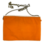 Liven up your outfit with this fun beaded clutch which has a chain strap so it also doubles as a crossbody or shoulder bag. The bright colours are orange/pink/white/blue. The back of the bag is orange canvas. Dimensions are 26cm x 16cm.