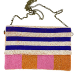 Liven up your outfit with this fun beaded clutch which has a chain strap so it also doubles as a crossbody or shoulder bag. The bright colours are orange/pink/white/blue. The back of the bag is orange canvas. Dimensions are 26cm x 16cm.