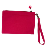 A fund little clutch with the word "soleil" on the front as well as stripes of orange and pink. The back is fuchsia canvas. A wrist strap and small pom poms are a fun addition. Dimensions are 20cm x 15cm.