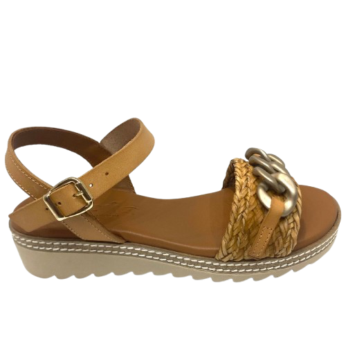 Made in Spain by Zeta, this comfortable low wedged sandal has a leather Y back with buckle, a raffia plaited strap across the toe and a "metallic" looking plastic chain trim. The natural colour of camel is an easy fit in any wardrobe.