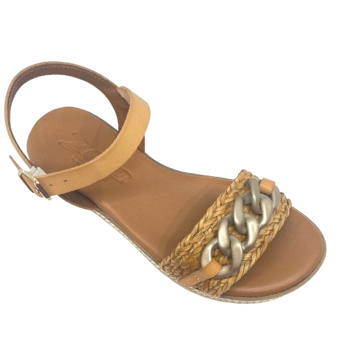 Made in Spain by Zeta, this comfortable low wedged sandal has a leather Y back with buckle, a raffia plaited strap across the toe and a "metallic" looking plastic chain trim. The natural colour of camel is an easy fit in any wardrobe.