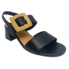 Black leather sandal with a 6cm block heel offering good support and foot coverage. The feature is a large raffia covered buckle on the strap across the instep.