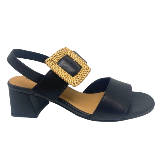 Black leather sandal with a 6cm block heel offering good support and foot coverage. The feature is a large raffia covered buckle on the strap across the instep.